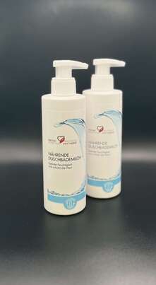 Sie sehen eine Packung Unifarco Duschbademilch, Produktbild: 01 Unifarco Duschbademilch, A-Nr.: 8024744 - 01