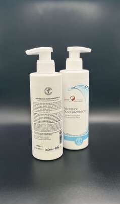 Sie sehen eine Packung Unifarco Duschbademilch, Produktbild: 02 Unifarco Duschbademilch, A-Nr.: 8024744 - 02