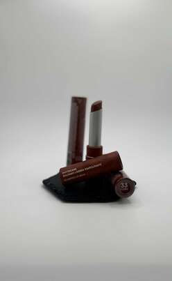 Sie sehen eine Packung Dolomia Lip Balm 33 1ST, Produktbild: 01 Dolomia Lip Balm 33 1ST, A-Nr.: 8021585 - 01